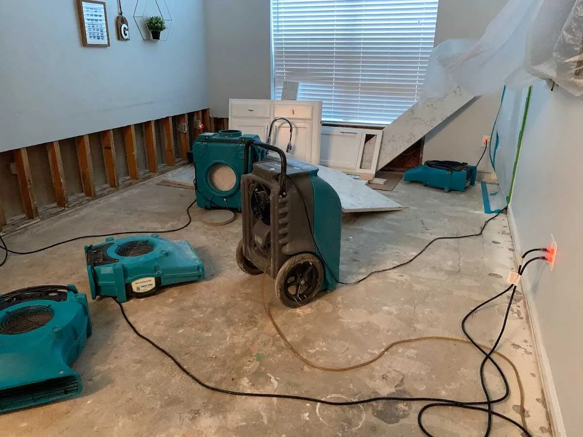 Dehumidifier in flood-cut room for Water Damage Restoration in Egelston